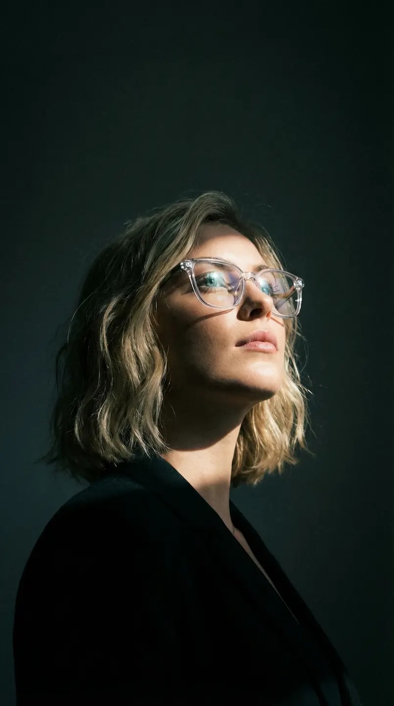 Dramatic Low-Angle Light Portrait – woman, AI image made with Nano Banana Pro