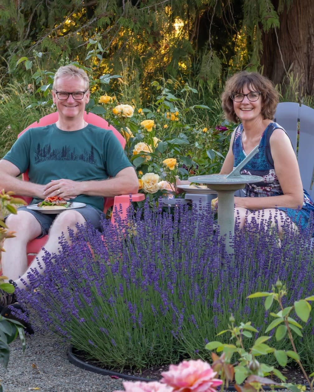 Adele Cave and her husband enjoy the rose garden she planted while recovering from colon cancer.