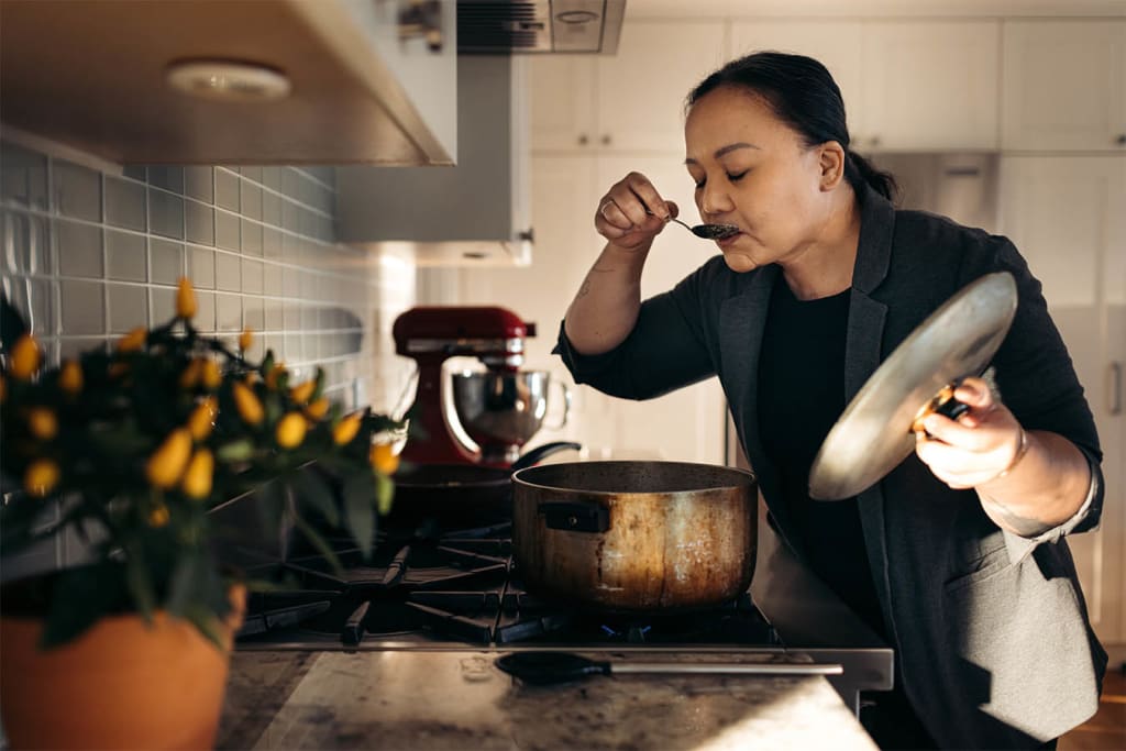 Rosalyn Salanguit preparing a meal