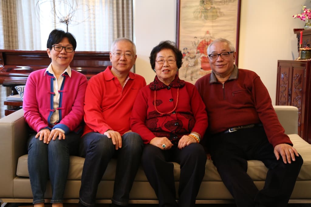 Ben Yeung and Jane Young pictured with their parents.