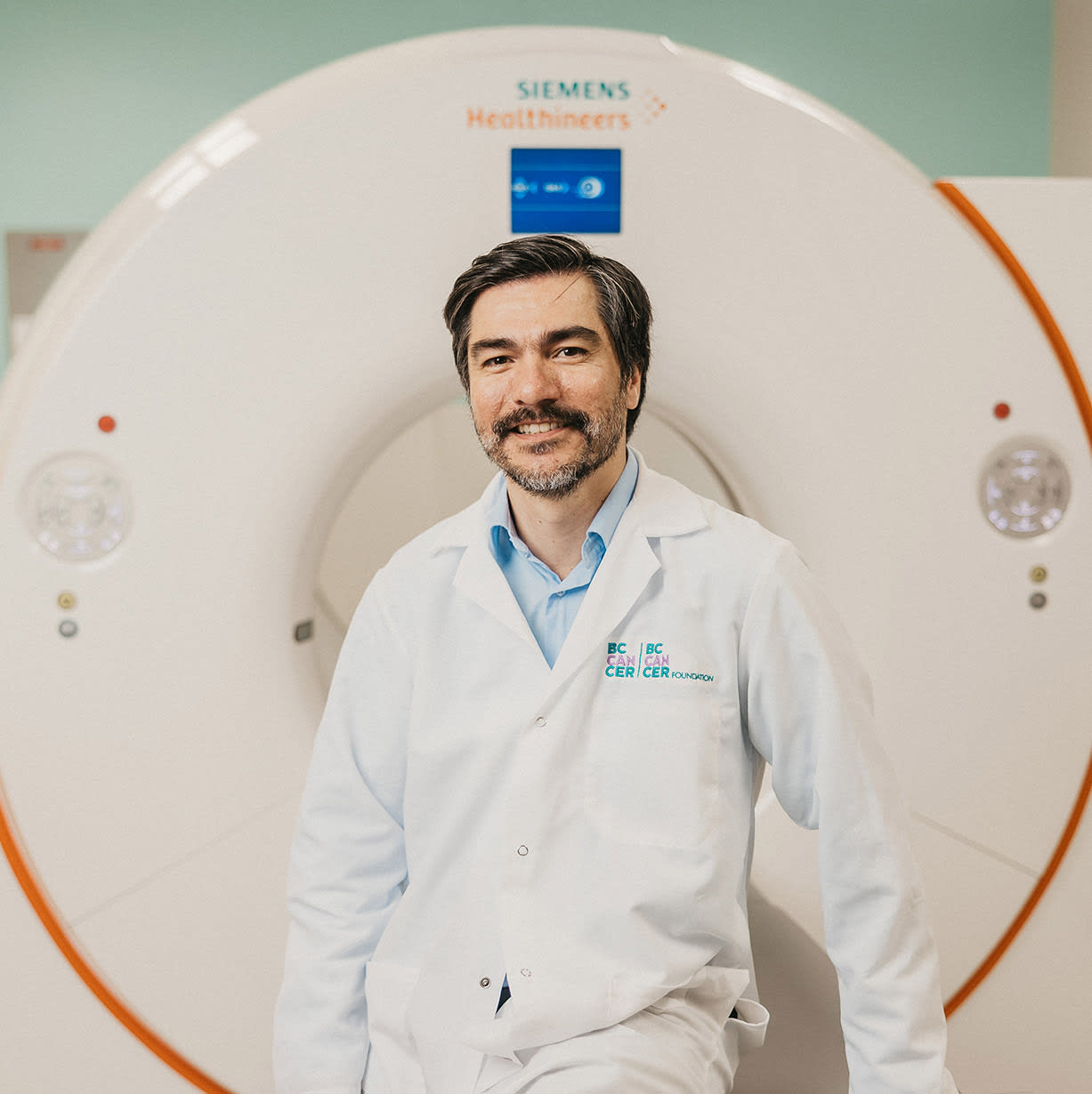 Dr. Carlos Uribe with PET/CT Scanner