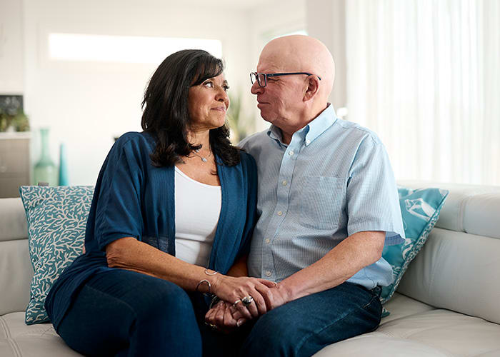 Dr. Roy Jackson staring into his wife's eyes