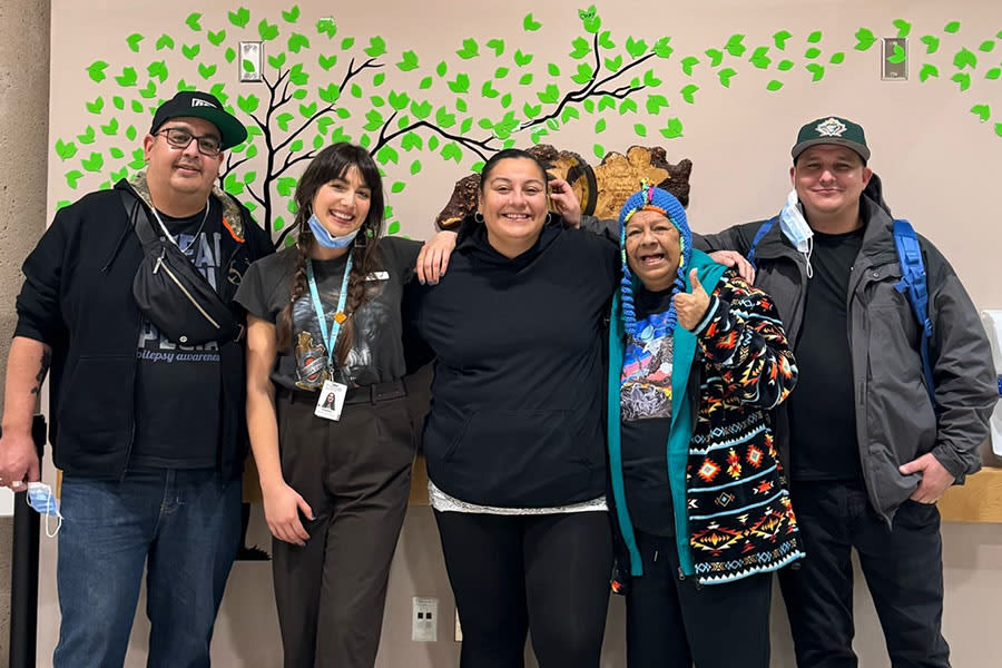 Mama Crow's family with Indigenous Patient Navigator, Vanessa Prescott