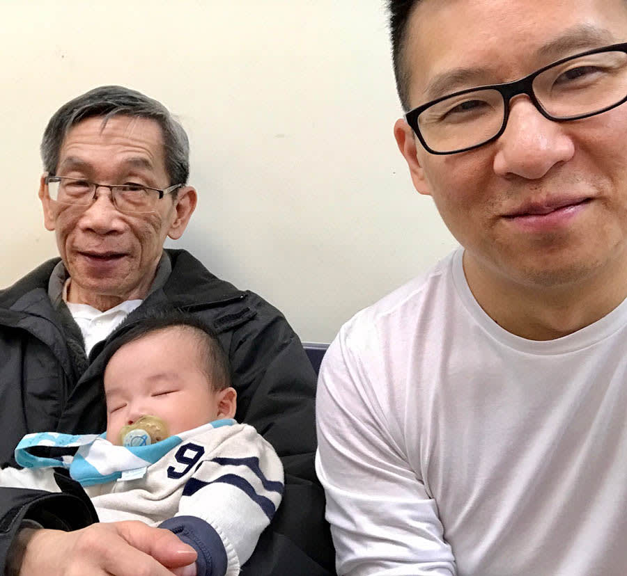 Chris Ho and his dad, Jeff, with his son Caden