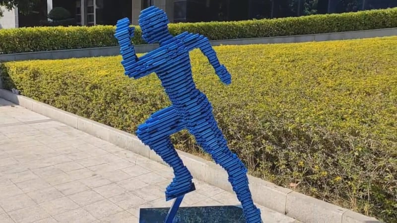 Bule Running Man Sculpture