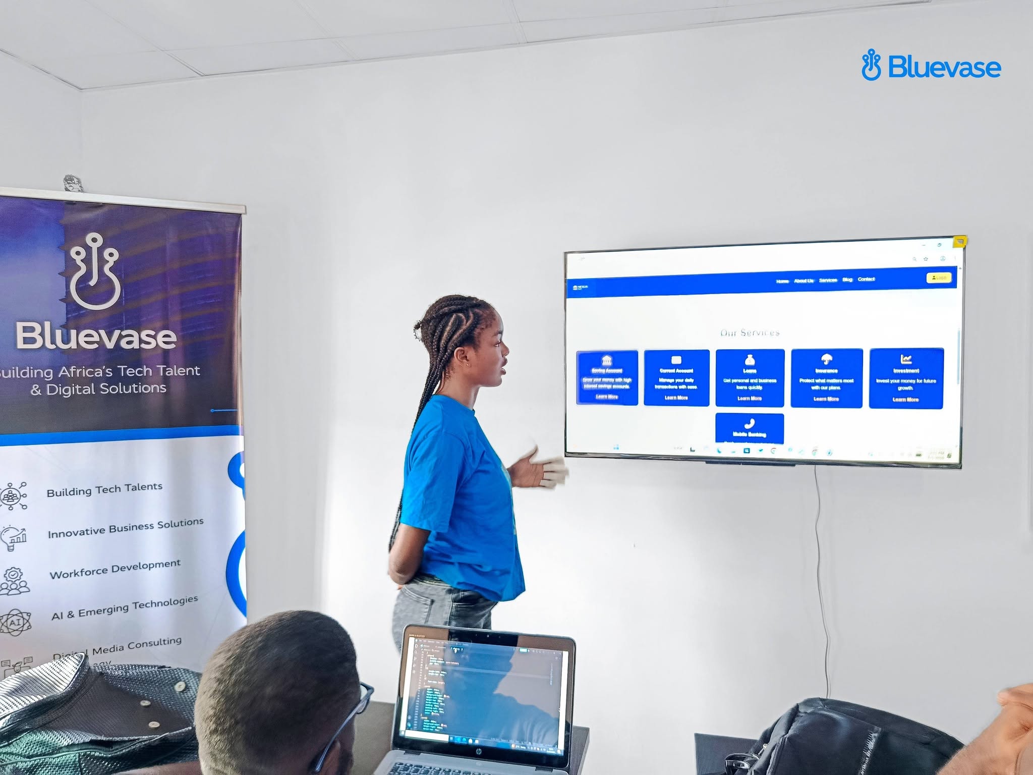 A woman in tech presenting during a capstone session, representing the BWiT program in Makurdi