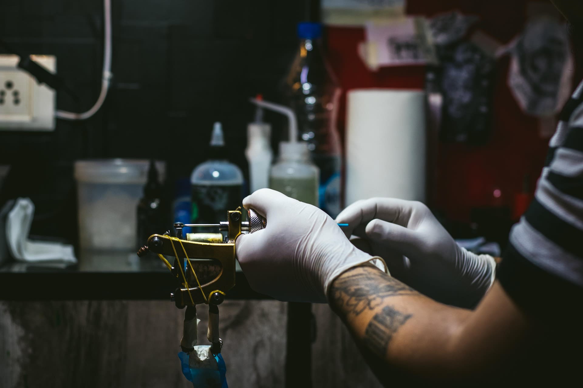 Tattoo artist working background