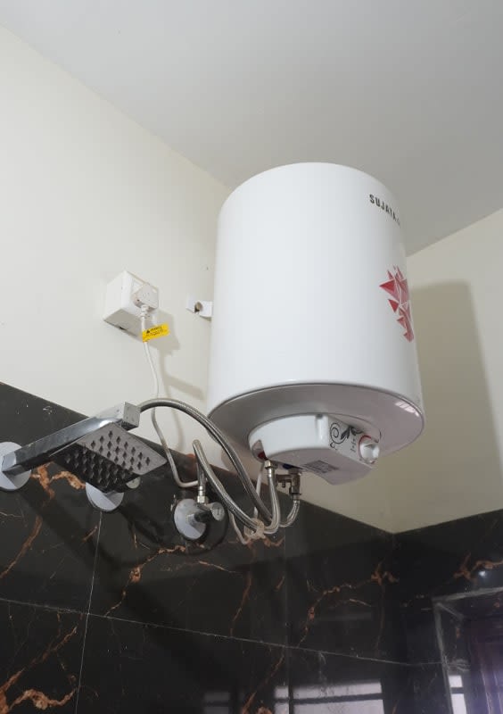 Geyser installed in a Sarab PG room for hot water