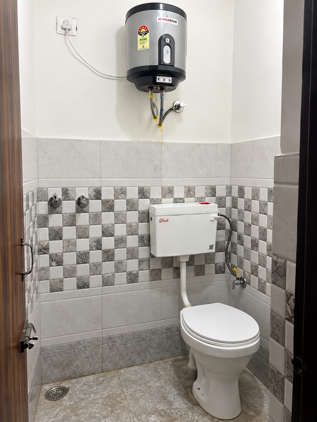 Attached washroom with geyser and Western toilet at Sarab PG in Gharuan near Chandigarh University