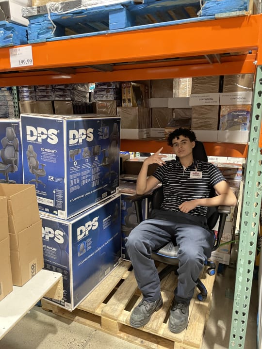 Ayman working at Costco
