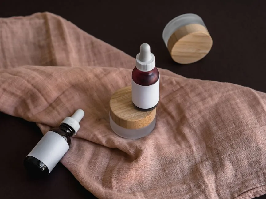 A skincare essence dropper bottle