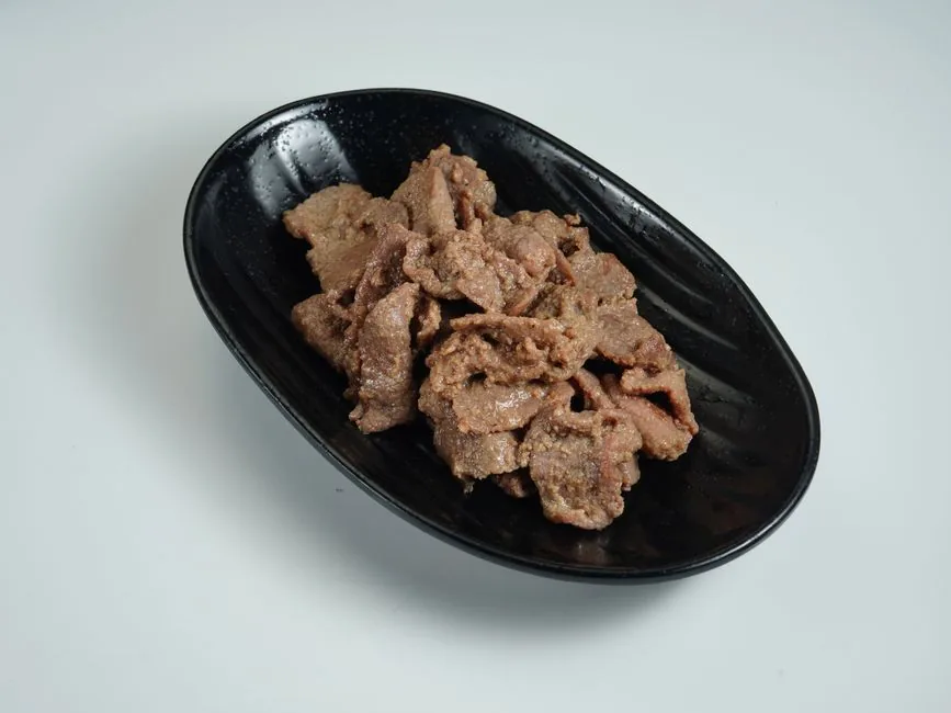 A plate of cooked bulgogi beef