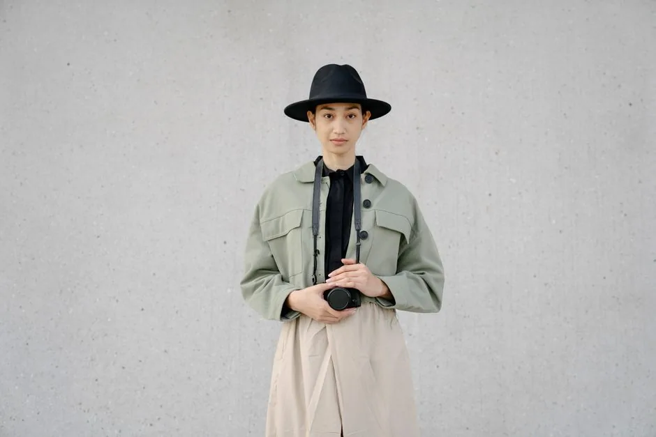 A clean, neutral-toned layered outfit