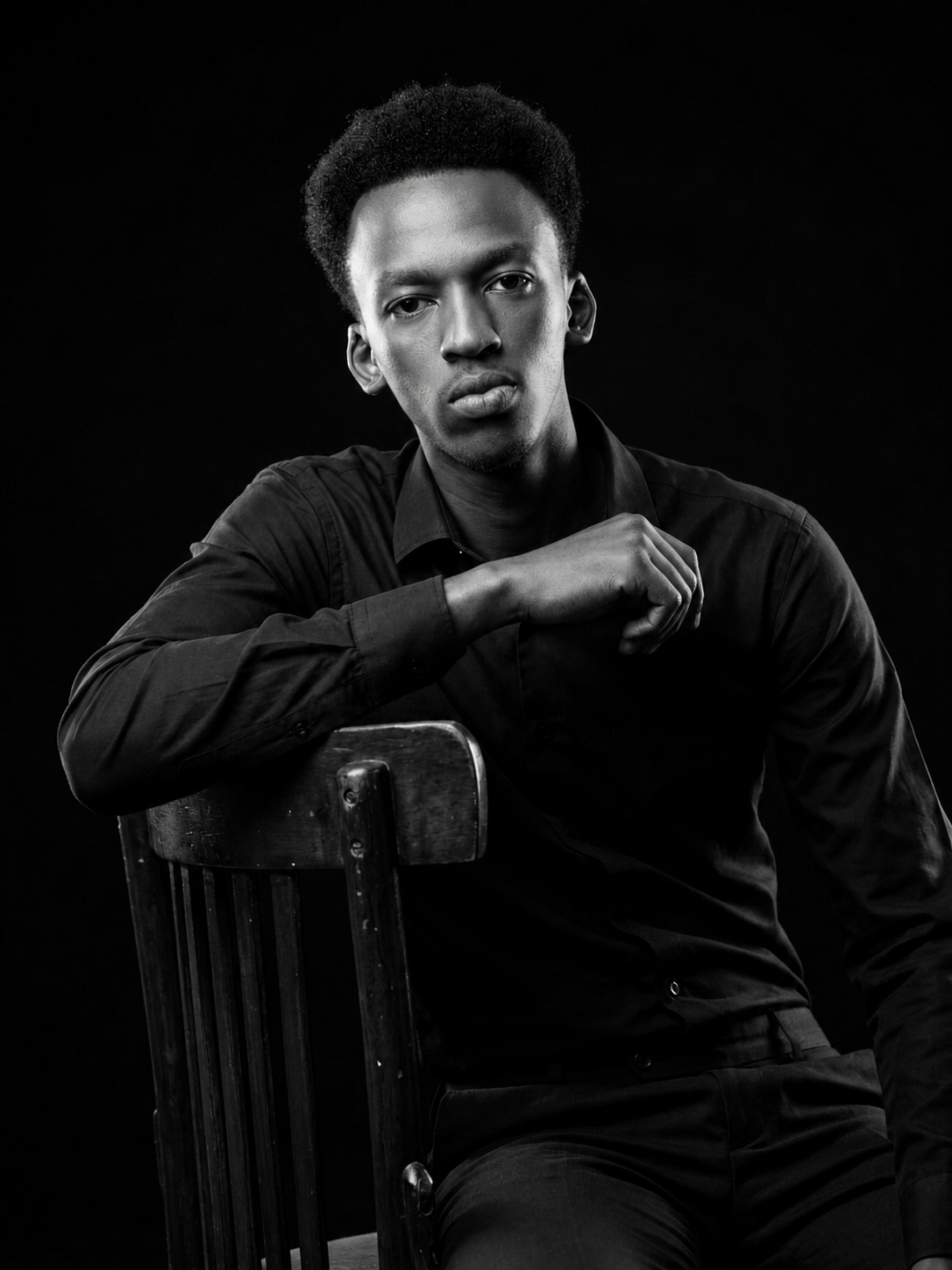 Black and white editorial portrait of Harry Kigen