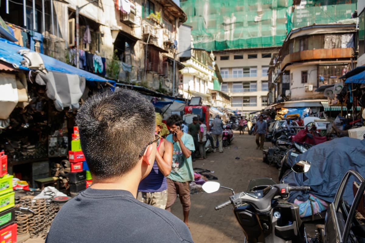 Digital payment interface on a smartphone in a busy Indian market