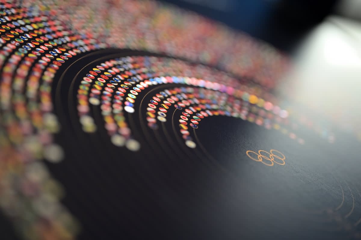 High-tech medical data visualization showing genomic strands merging with digital health icons