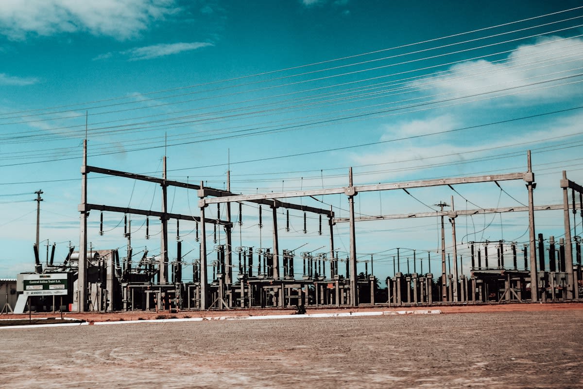 Electrical substation with battery storage containers