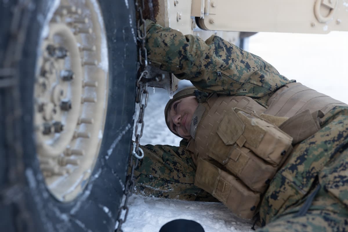 military all-terrain vehicle in snow
