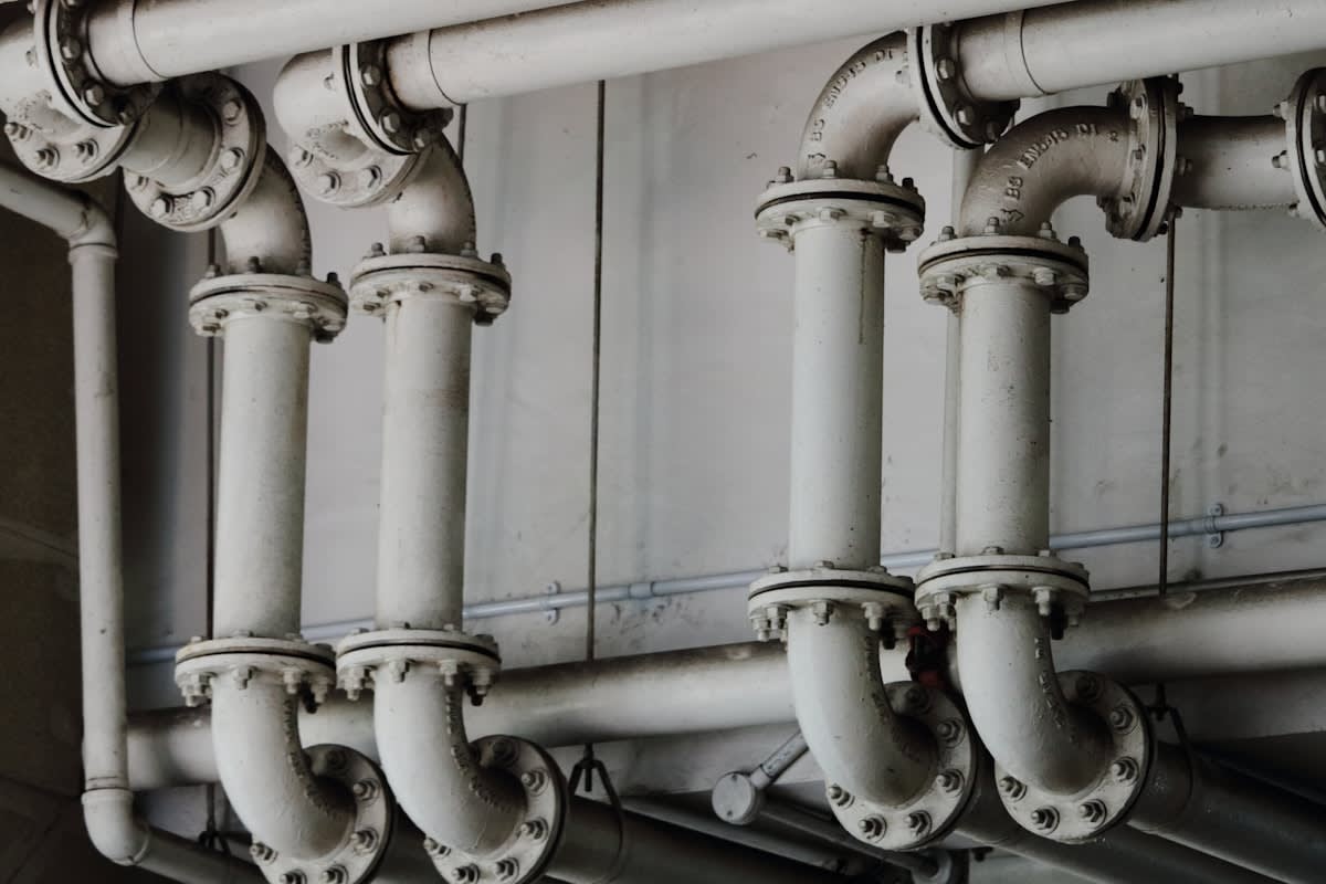 Close up of industrial shipping pipes and valves