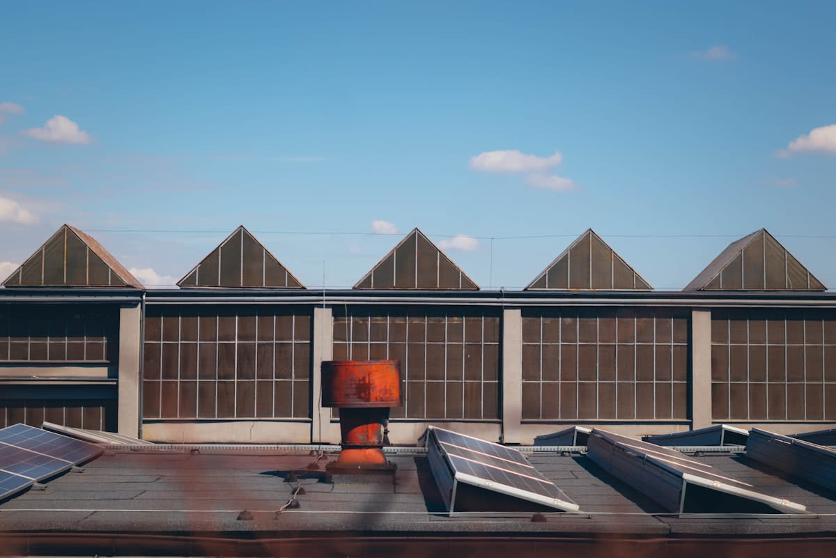 industrial solar panels on factory roof
