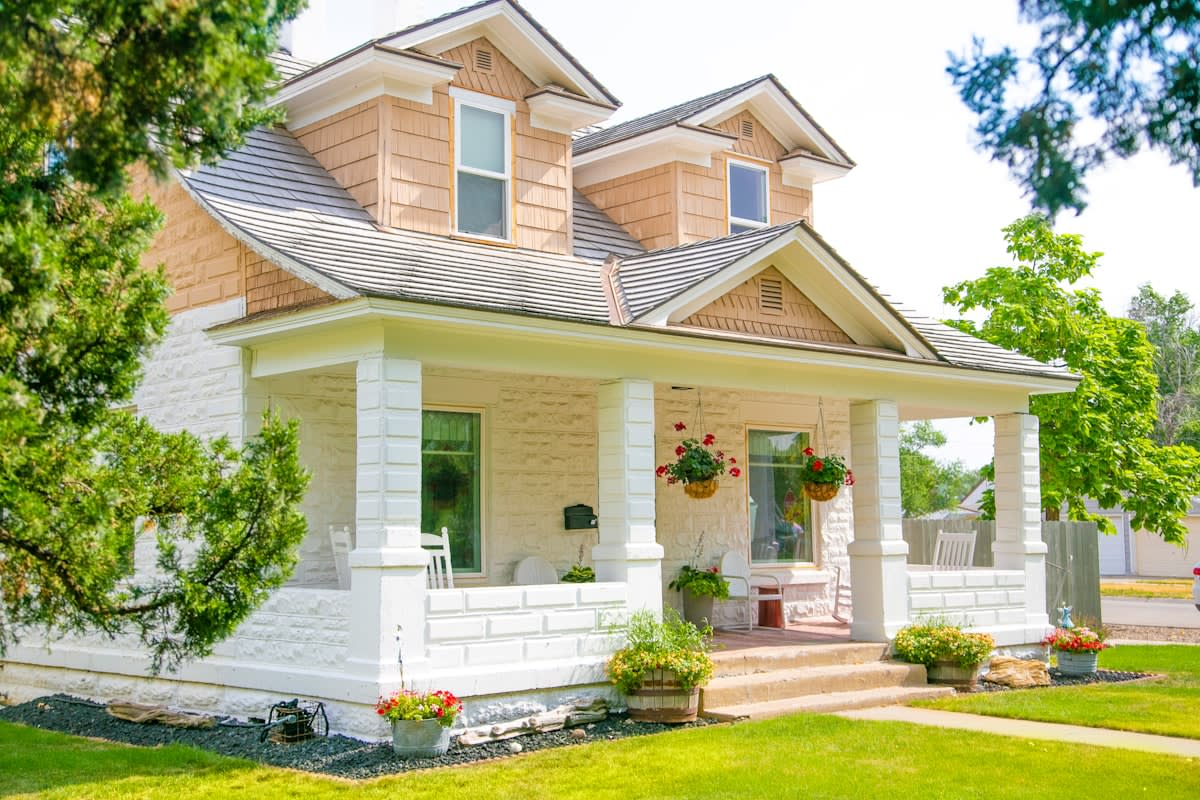 Modern heritage home design with a large front porch