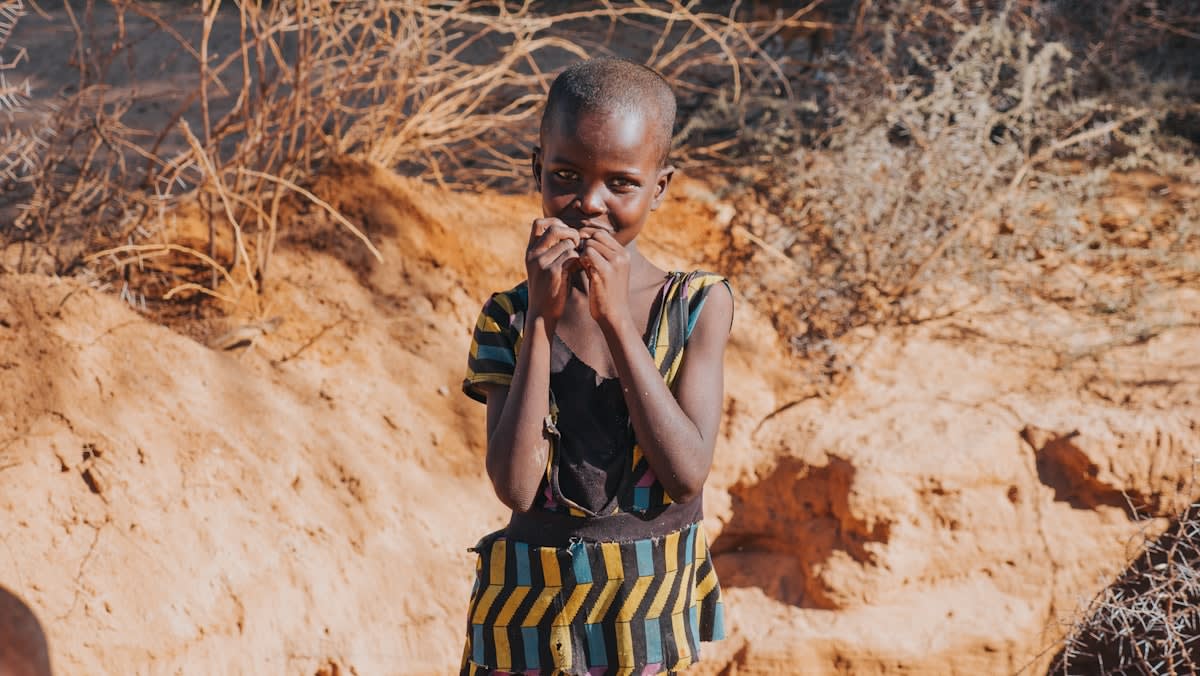 Maasai musician using a smartphone in Kenya