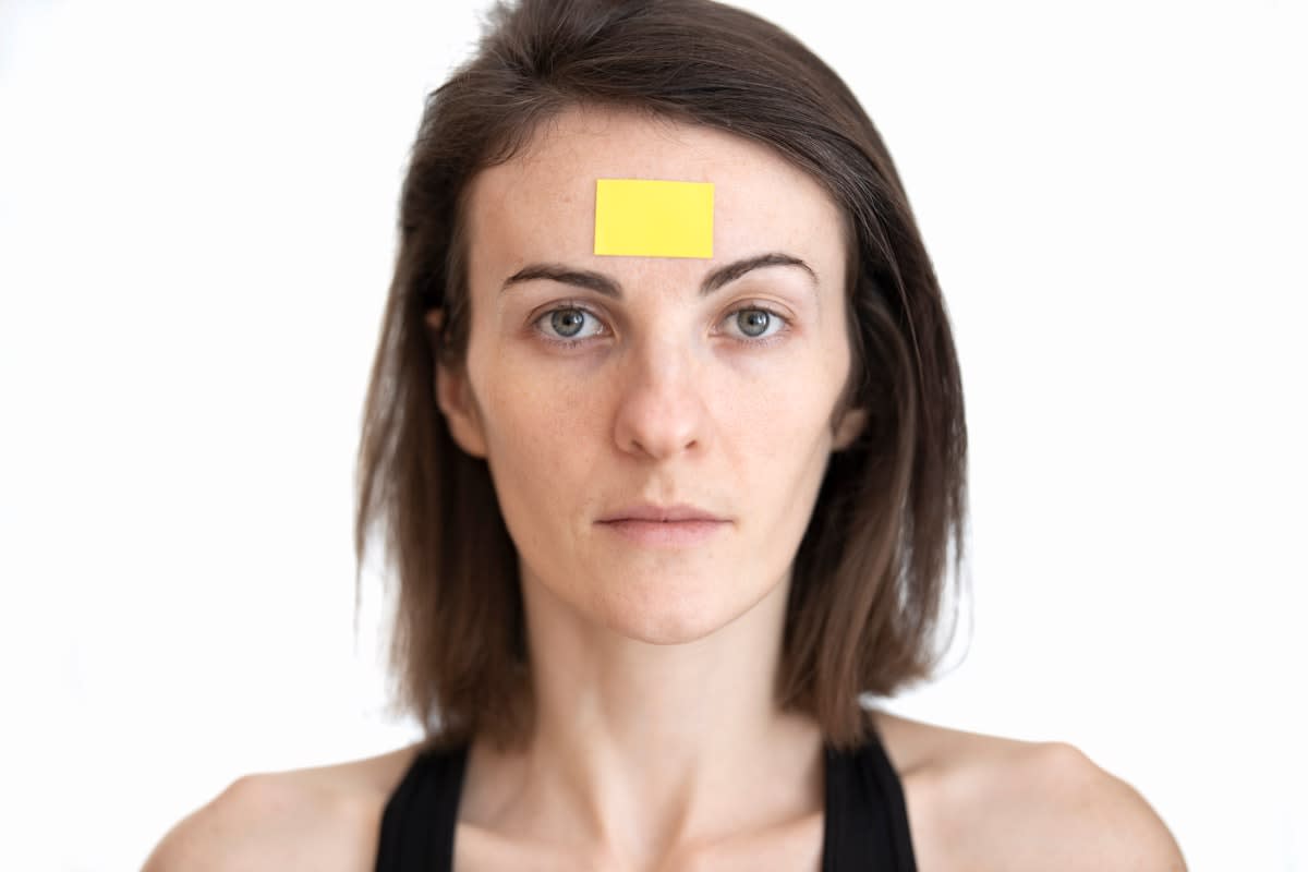 Digital facial analysis software overlay on a human face