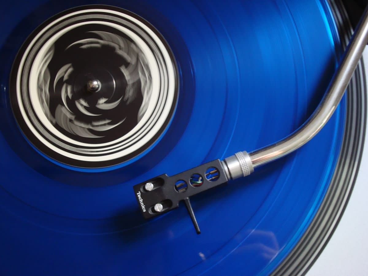 Close up of a vinyl record player needle