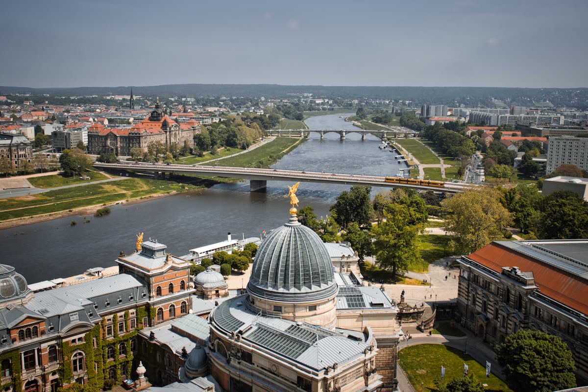 Aerial view of a European city with green spaces
