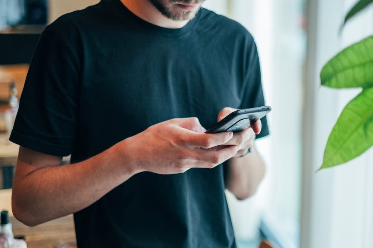 person using smartphone for shopping