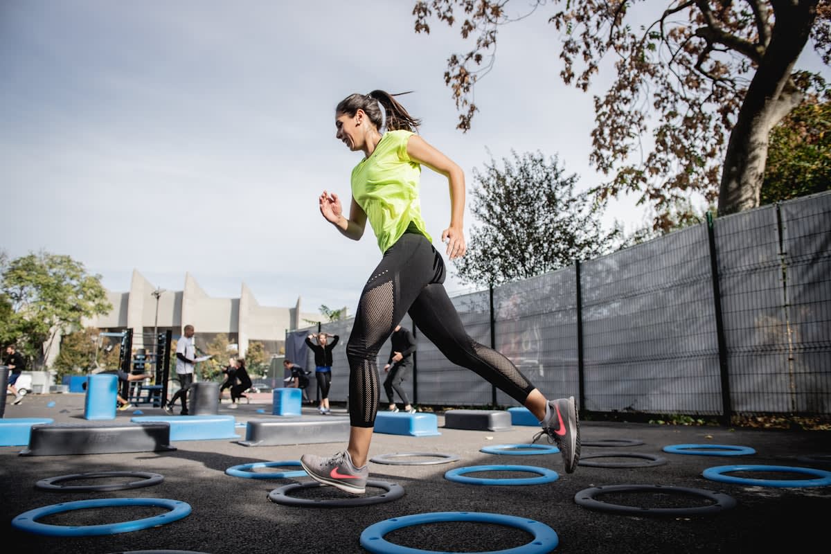 Athlete performing plyometric jumps with weights