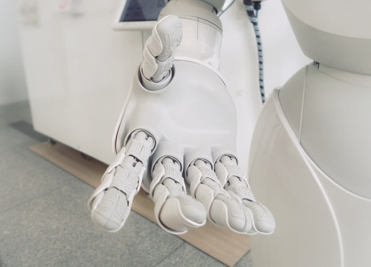 Advanced humanoid robot hand manipulating a delicate object