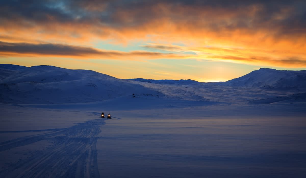 Autonomous heavy-duty rover in a snowy Arctic landscape