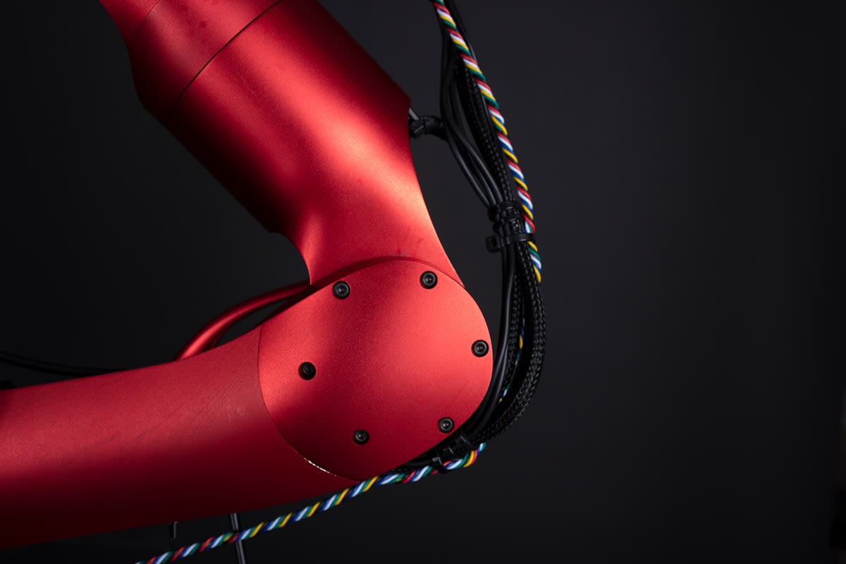 Close up of robotic joint with cable systems