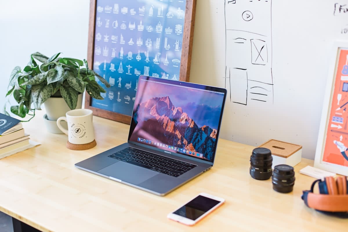 Multiple laptops on a clean desk