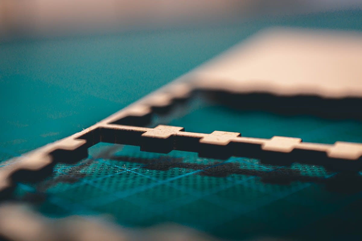 Close up of a silicon photonic chip with laser waveguides