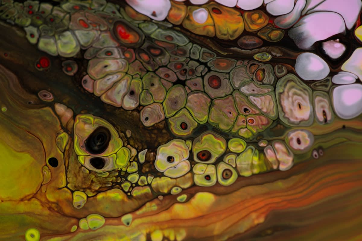 microscopic view of DNA structures mixed with paint pigments