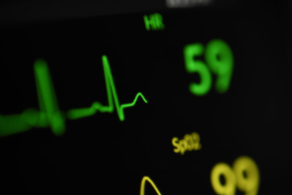 Close up of a digital health dashboard showing heart rate and sleep data