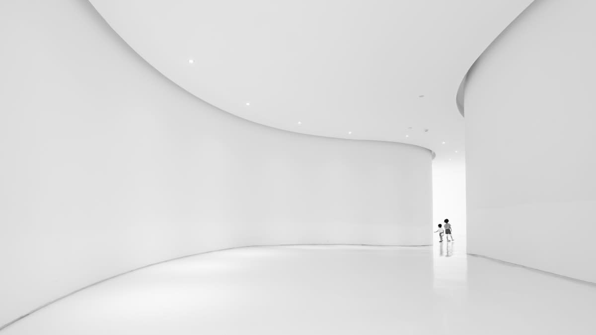 Modern art gallery interior with minimalist white walls