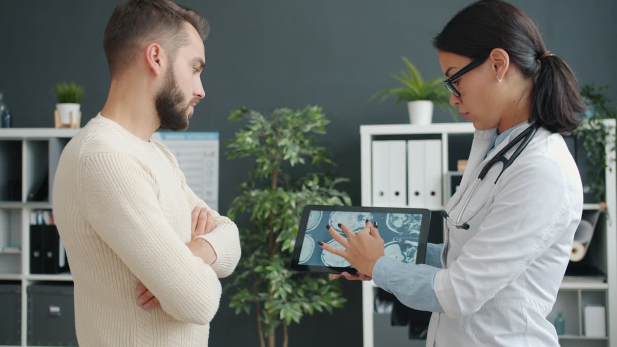 Clinician using a tablet in a clinic