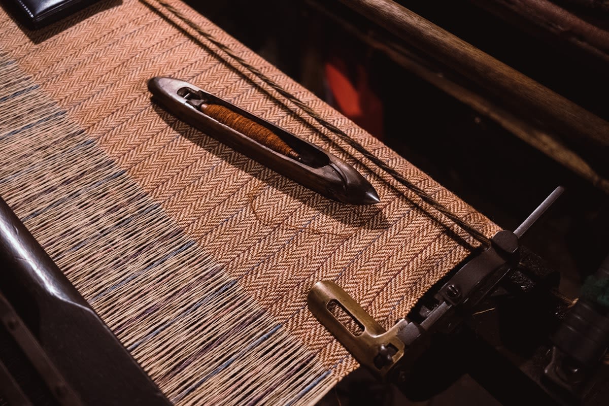 Close up of traditional Southeast Asian loom with digital sensors