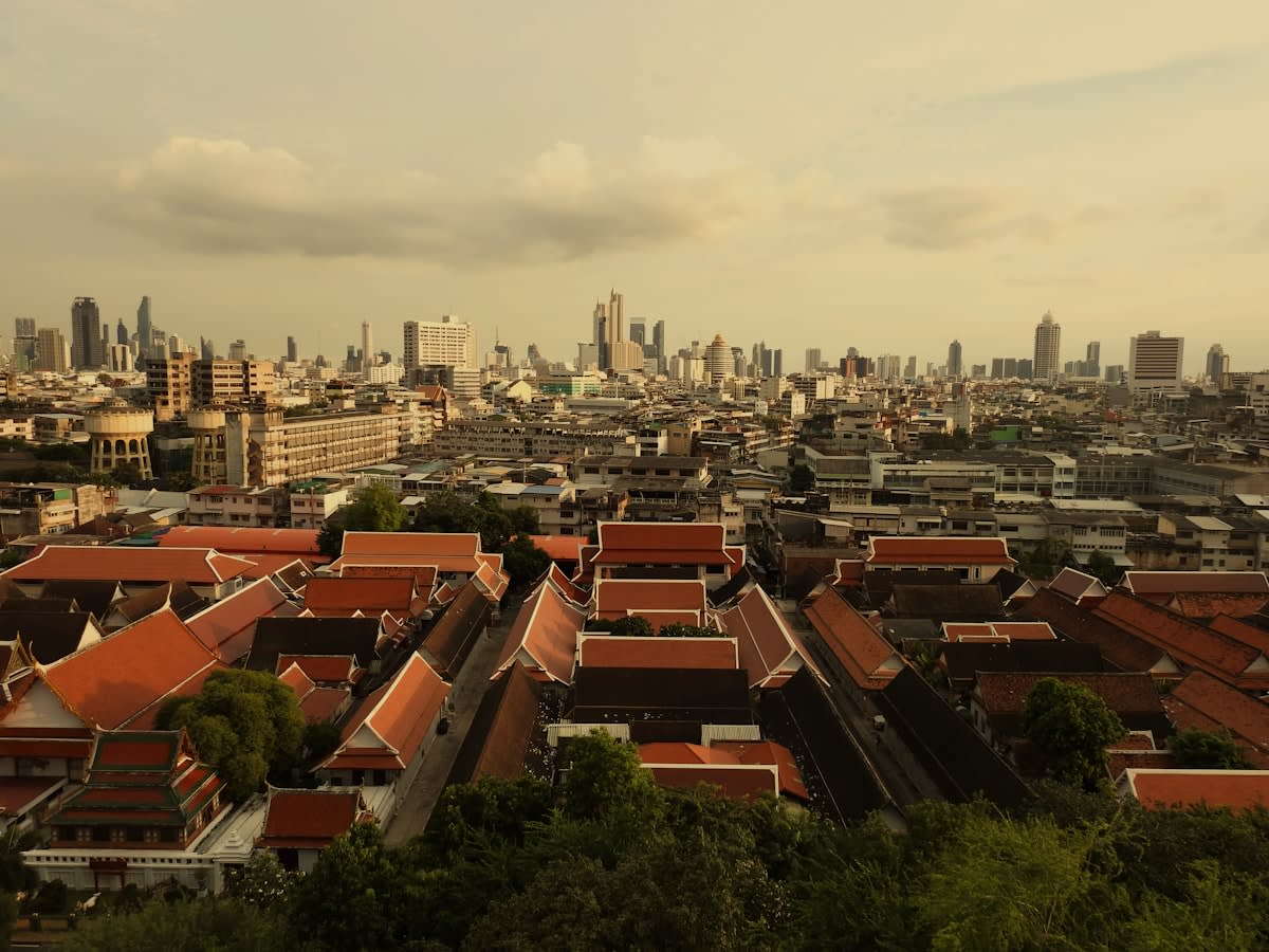 Aerial view of a dense Southeast Asian historic district with digital overlay