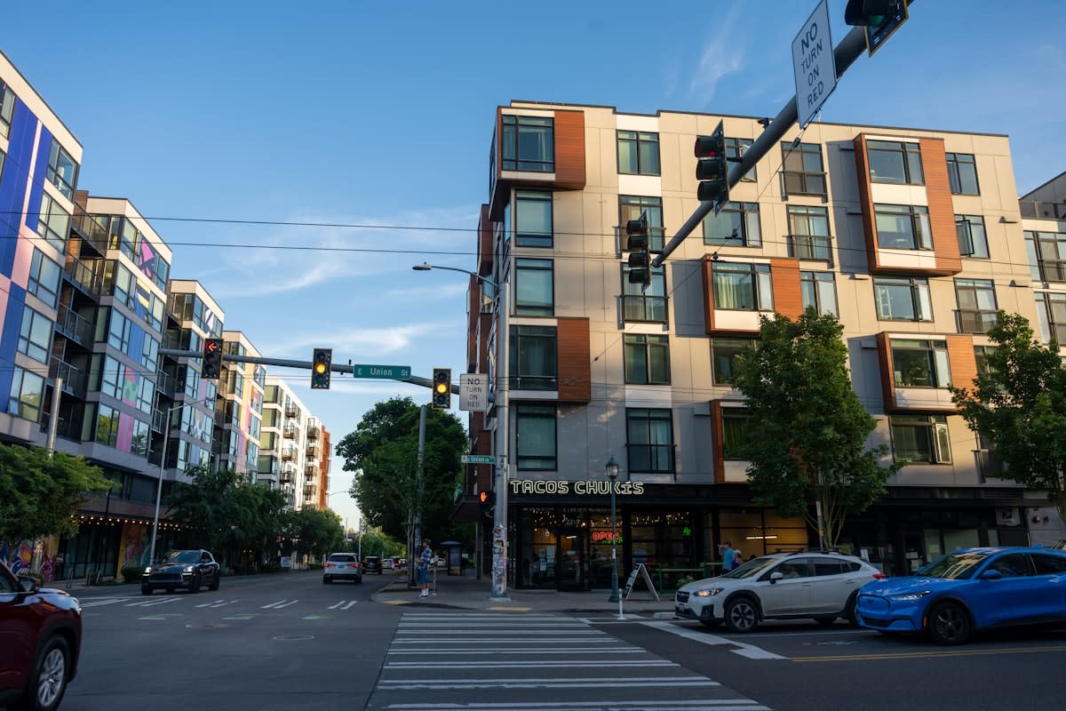 Modern mixed-use urban development with integrated residential and retail spaces