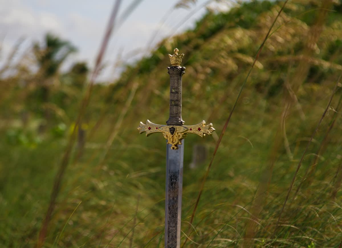 Ancient bronze sword archaeological dig