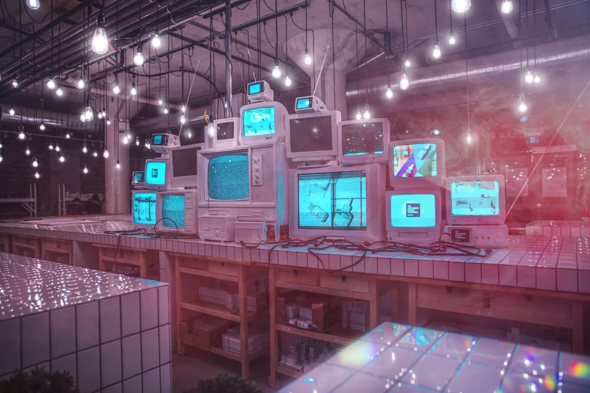 High tech studio render farm with monitors showing generative AI layers