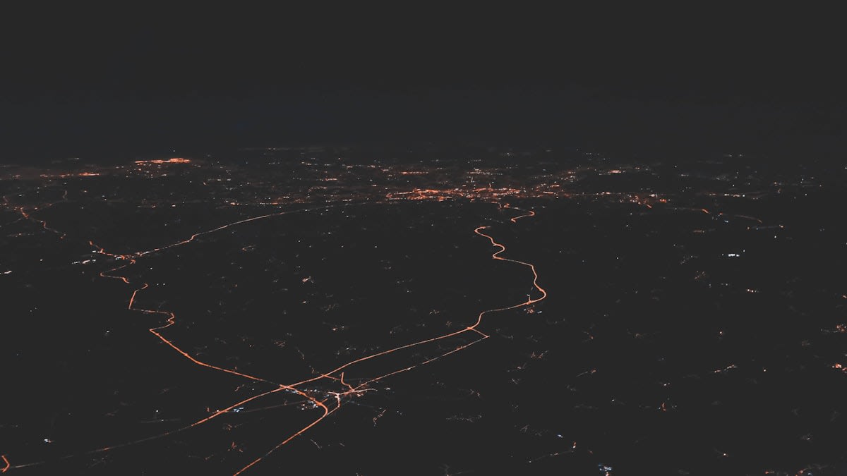 Satellite orbiting earth with glowing connection lines