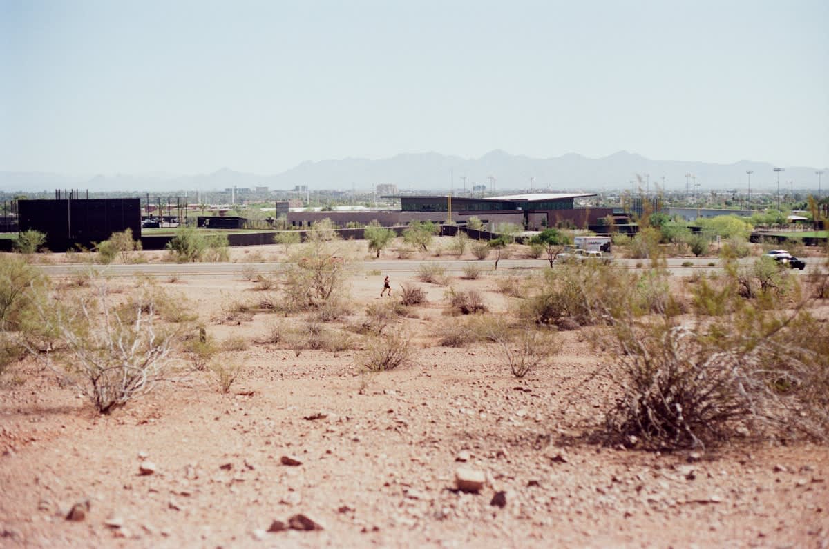 Aerial view of semiconductor fabrication plant construction in Arizona desert