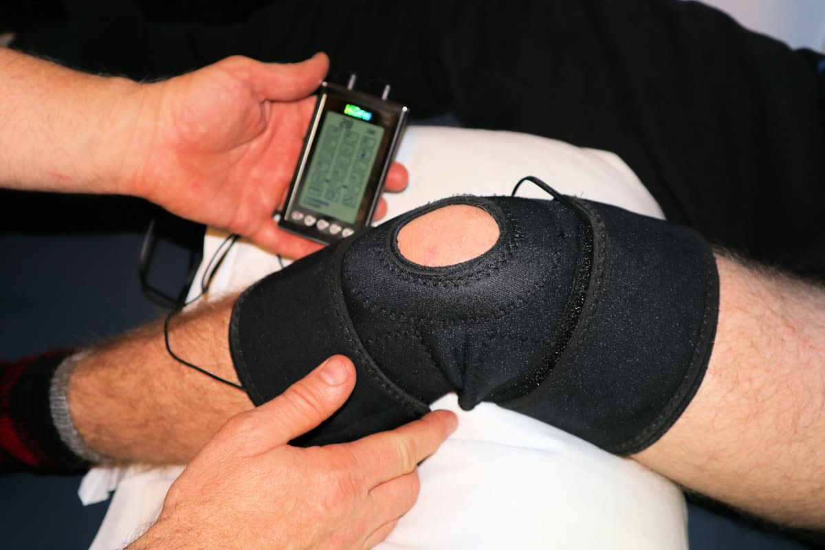Close up of an athlete undergoing physical therapy or health monitoring