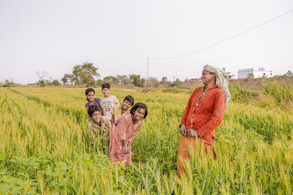 Farmers discussing regenerative agriculture techniques
