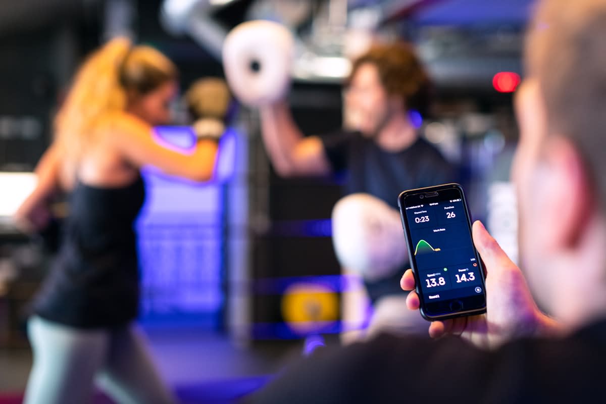Athlete training in a high-tech gym with monitoring equipment
